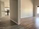 Open-concept living room showcasing the transition to the kitchen and dining area at 1704 E Redfield Rd, Gilbert, AZ 85234