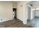 Inviting living area with neutral paint, wood floors, and recessed lighting at 1704 E Redfield Rd, Gilbert, AZ 85234