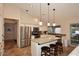 Bright kitchen with stainless appliances, island, and lots of natural light at 17211 N 58Th St, Scottsdale, AZ 85254