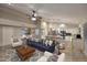 Open concept living room and kitchen with eat in island and lots of seating at 17211 N 58Th St, Scottsdale, AZ 85254