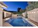 Sparkling pool and patio area perfect for outdoor gatherings, illuminated at dusk at 17211 N 58Th St, Scottsdale, AZ 85254