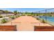 Bocce ball court with a tennis court provides a variety of recreational opportunities at 17320 W Daley Ln, Surprise, AZ 85387