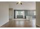A cozy living area with tile flooring, neutral paint, and an abundance of natural light at 1744 W Brookwood Ct, Phoenix, AZ 85045