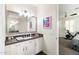 Charming bathroom with granite countertops, vanity, updated fixtures, and next to the bedroom at 18550 N 94Th St, Scottsdale, AZ 85255
