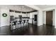 Well-equipped kitchen featuring stainless steel appliances, an eat-in island, and pendant lighting at 18550 N 94Th St, Scottsdale, AZ 85255