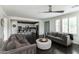 Open-concept living room showcasing hardwood floors and seamless transition to a modern kitchen at 18550 N 94Th St, Scottsdale, AZ 85255