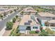 Aerial view of the property showcasing solar panels, landscaped yard and covered patio at 1876 S Huish Dr, Gilbert, AZ 85295