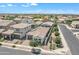Beautiful aerial view of the home showcasing its tile roof and well-maintained landscaping at 1876 S Huish Dr, Gilbert, AZ 85295