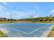 Community basketball court with well maintained surface and landscaping under a clear sky at 1876 S Huish Dr, Gilbert, AZ 85295