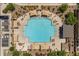 Overhead shot of community pool, highlighting its expansive deck and inviting lounge areas at 1876 S Huish Dr, Gilbert, AZ 85295