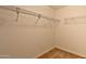 Well-organized closet space featuring wire shelving for easy storage and access, maximizing space at 19002 N Toledo Ave, Maricopa, AZ 85138