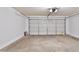 Spacious garage offering ample parking and storage space, providing convenience and organization at 19002 N Toledo Ave, Maricopa, AZ 85138