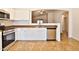 A spacious kitchen with stainless steel appliances and an open concept design for easy entertaining at 19002 N Toledo Ave, Maricopa, AZ 85138