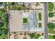 Aerial view of a home with a large gravel yard, concrete patio, and square of well manicured lawn at 19935 E Via Del Palo --, Queen Creek, AZ 85142