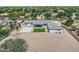 Single story home with a large gravel yard, concrete patio, and a well-manicured lawn in a tidy, square plot at 19935 E Via Del Palo --, Queen Creek, AZ 85142