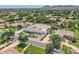 Expansive community home featuring large gravel yard and lush green landscaping; beautiful mountain views in background at 19935 E Via Del Palo --, Queen Creek, AZ 85142