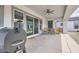 Cozy back patio featuring outdoor seating, a BBQ grill, and stylish décor perfect for relaxing and entertaining at 19935 E Via Del Palo --, Queen Creek, AZ 85142