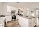 This spacious kitchen features modern appliances, a large island, and sleek countertops at 19935 E Via Del Palo --, Queen Creek, AZ 85142