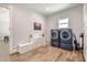 Well-equipped laundry room with modern washer and dryer, ample storage cabinets, and a clean, organized space at 19935 E Via Del Palo --, Queen Creek, AZ 85142