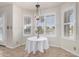 Cozy breakfast nook featuring large windows with a view and pendant lighting at 20410 N 51St Dr, Glendale, AZ 85308