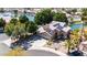 Beautiful two-story home with a three-car garage, desert landscaping and solar panels, all on a picturesque waterfront lot at 20410 N 51St Dr, Glendale, AZ 85308