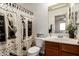 Charming bathroom with vintage-themed decor and a spacious vanity at 22191 W Tonto St, Buckeye, AZ 85326