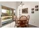 Bright dining area with sliding glass doors and views of the backyard at 22191 W Tonto St, Buckeye, AZ 85326