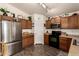 Efficient kitchen with stainless steel appliances and plentiful storage at 22191 W Tonto St, Buckeye, AZ 85326