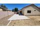 Wide backyard featuring a modern paved patio, perfect for outdoor living and entertainment at 2433 W Hayden Peak Dr, San Tan Valley, AZ 85144