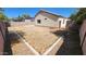 Backyard featuring a concrete patio, ready for outdoor enjoyment in a private, walled space at 2433 W Hayden Peak Dr, San Tan Valley, AZ 85144