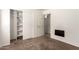 This bedroom showcases a closet with open shelving and a door to another room at 2433 W Hayden Peak Dr, San Tan Valley, AZ 85144