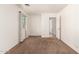 Well-lit bedroom features carpet flooring and a window at 2433 W Hayden Peak Dr, San Tan Valley, AZ 85144