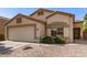 Single Gathering home featuring a 2-car garage, desert landscaping, and a tile roof at 2433 W Hayden Peak Dr, San Tan Valley, AZ 85144