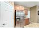 The kitchen features stainless steel appliances and light wood cabinetry at 2533 W Cordia Ln, Phoenix, AZ 85085