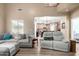 Comfortable living room featuring neutral tones, plush seating, and an open floor plan at 2533 W Cordia Ln, Phoenix, AZ 85085