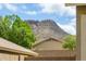 Mountain view from backyard with block fence and desert landscaping at 25825 N 65Th Ave, Phoenix, AZ 85083