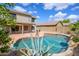 View of the refreshing backyard pool, patio area and beautiful landscaping of this home at 25825 N 65Th Ave, Phoenix, AZ 85083