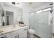 Modern bathroom featuring stylish vanity, glass-enclosed shower, and contemporary fixtures with bright lighting at 25825 N 65Th Ave, Phoenix, AZ 85083