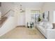 Bright living room with staircase, neutral paint, and comfortable seating area that creates a welcoming atmosphere at 25825 N 65Th Ave, Phoenix, AZ 85083