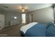 Spacious bedroom featuring a ceiling fan, neutral walls, and carpeted flooring at 30395 W Mitchell Ave, Buckeye, AZ 85396