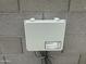 Pentair IntelliConnect control and monitoring system mounted on a gray concrete block wall at 30395 W Mitchell Ave, Buckeye, AZ 85396