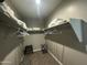 Walk-in closet showcasing shelving and hanging space for clothes and storage at 30395 W Mitchell Ave, Buckeye, AZ 85396