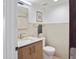 Bright bathroom with white countertops and a modern faucet with a decorative towel at 309 E Huntington Dr, Tempe, AZ 85282