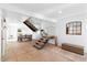 Bright entryway featuring a modern staircase, tile flooring, and dining room, creating a welcoming atmosphere at 309 E Huntington Dr, Tempe, AZ 85282