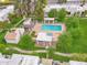 Aerial view of a community pool area surrounded by lush green landscaping at 309 E Huntington Dr, Tempe, AZ 85282
