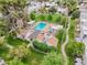 Aerial view of a community pool surrounded by lush greenery and manicured lawns at 309 E Huntington Dr, Tempe, AZ 85282