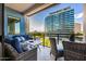 Cozy balcony with seating area offering a striking view of the city skyline at 3131 N Central Ave # 6010, Phoenix, AZ 85012