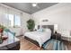 Bright bedroom with a modern bed frame, city views, and stylish decor, offering a comfortable retreat at 3131 N Central Ave # 6010, Phoenix, AZ 85012