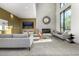 Comfortable common area with modern sofas, accent chairs, a fireplace, and stylish decor, perfect for socializing at 3131 N Central Ave # 6010, Phoenix, AZ 85012