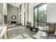 Inviting common area featuring large windows, comfortable seating, a modern fireplace, and stylish accents at 3131 N Central Ave # 6010, Phoenix, AZ 85012